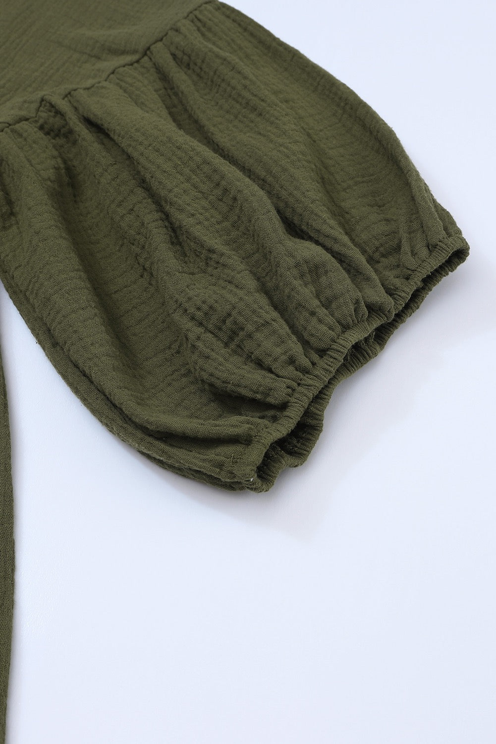 Green textured babydoll blouse
